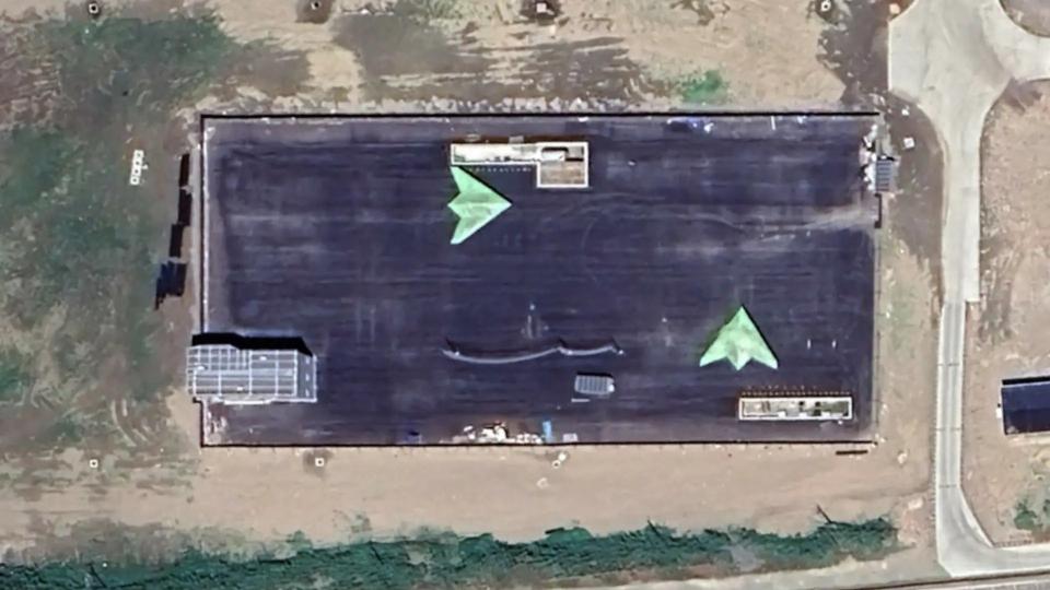 Apparent mockups of China’s stealthy GJ-11 UCAV on Changxing Island in Shanghai. <em>Google Earth</em>