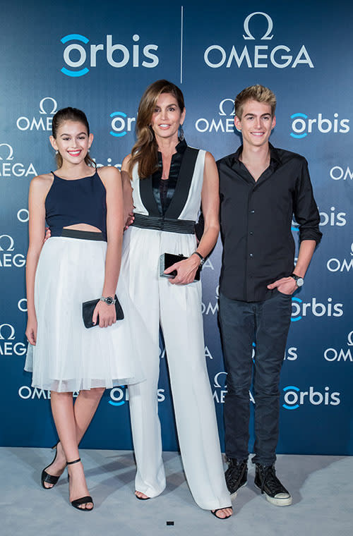 When Cindy Crawford's your parent, getting the "you look just like your mum" compliment isn't an insult, it's one of the highest compliments. In Hong Kong, Crawford and her 13-year-old daughter Kaia Gerber dressed in similar looking outfits. The model's mini-me wore a dress that was reminiscent of Carrie Bradshaw's white "Sex and the City" tutu, but Gerber updated hers with a cutout top. The 49-year-old, on the other hand, went for the more sophisticated version made in the same fabric, though in jumpsuit with wide leg pants form.