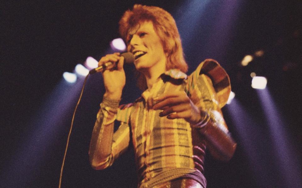 David Bowie on his Ziggy Stardust/Aladdin Sane tour at Earl’s Court in May 1973 - Hulton Archive