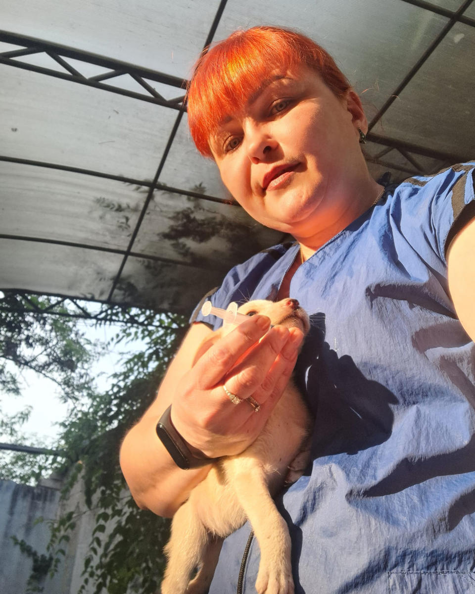 Irina Tutyun with a puppy in Kherson on Thursday. (Irina Alexandrovna / Facebook)