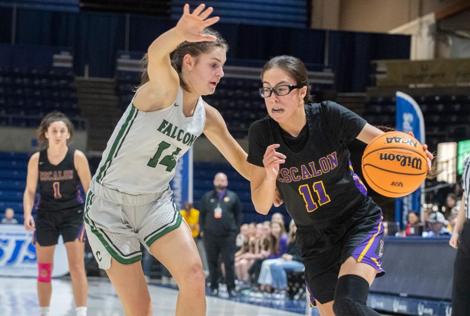Escalon's Arianna Velasco, right, drives to the hoop past Colfax's Laurlyn Massick during the Sac-Joaquin Section Div. 4 girls basketball championship game at U.C. Davis' University Credit Union Center in Davis on Feb. 23, 2024. Escalon lost 64-48.