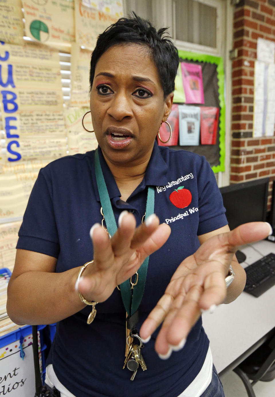 Key Elementary School principal Dionne Woody says her third grade teachers were plowing ahead with reading instruction at the Jackson, Miss., school, Thursday, April 18, 2019, even after their students took the state mandated reading tests, to ensure students are ready for fourth grade. The continued emphasis on reading also gives kids who fail initially a fighting chance on a retest. (AP Photo/Rogelio V. Solis)
