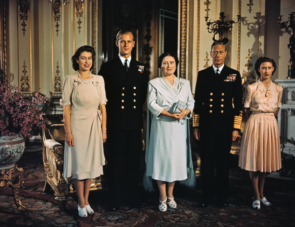 (Original Caption) Photograph shows Princess Elizabeth, Lieutenant Phillip Mountbatten, her then fiance, her mother, then Queen Elizabeth, now the Queen Mother, and her father, King George VI, in a family photograph made shortly before the Princess's wedding.