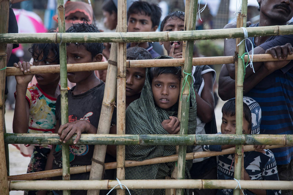 <p>Children wait for hot food given out by a Turkish aid group on October 13, at Palongkhali refugee camp, Cox’s Bazar, Bangladesh. (Photograph by Paula Bronstein/Getty Images) </p>