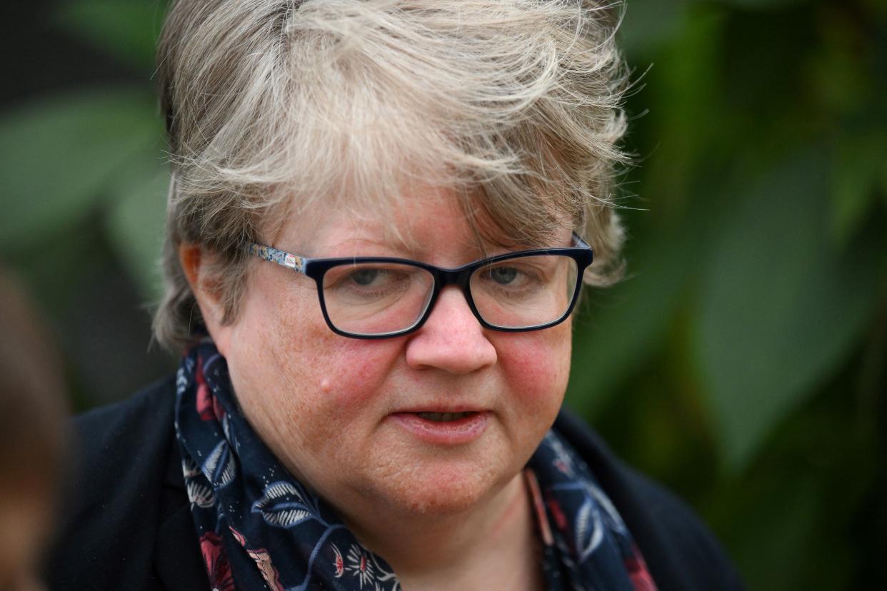 Britain's Environment, Food and Rural Affairs Secretary Therese Coffey attends a visit by South Africa's president to the Royal Botanic Gardens in Kew, southwest London, on November 23, 2022 on the second day of his two-day state visit. - South Africa's President Cyril Ramaphosa urged rich nations to help save vulnerable ones from climate change, as he made the first state visit of King Charles III's reign. (Photo by Daniel LEAL / AFP) (Photo by DANIEL LEAL/AFP via Getty Images)