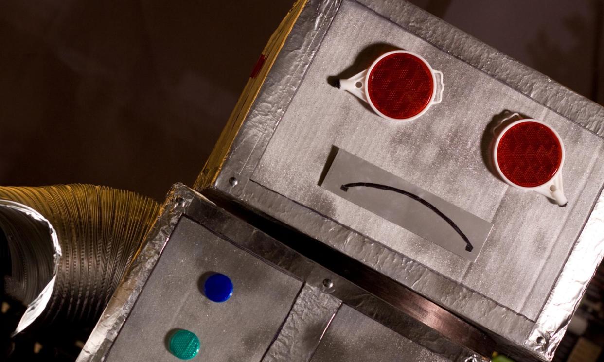 <span>This robot looks sad – why not cheer it up by answering these quiz questions?</span><span>Photograph: Ian McDonnell/Getty Images</span>