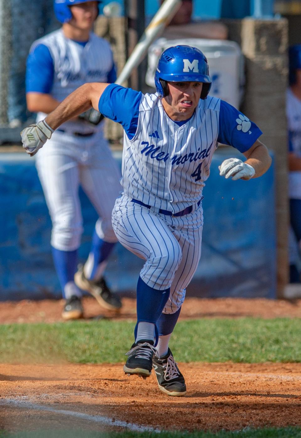 Memorial’s Caleb Ellspermann (4) bolts to first as the Tigers play the Castle Knights during the final SIAC game of the season at N.J. Stone Field in Evansville, Ind., Tuesday afternoon, May 9, 2023