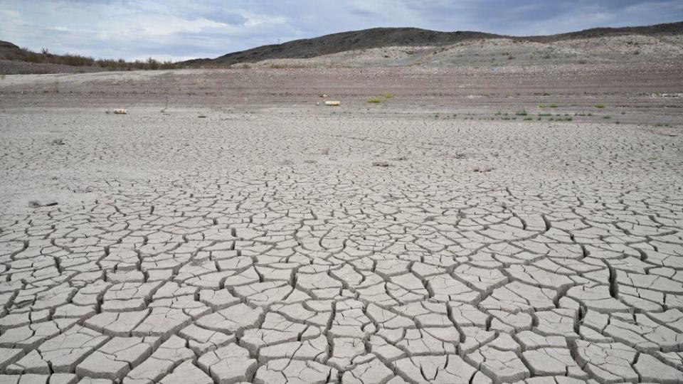 Buoys that read 'No Boats' lay on cracked dry earth where water once was at Lake Mead, Nevada, on July 23, 2022. / Credit: Getty Images