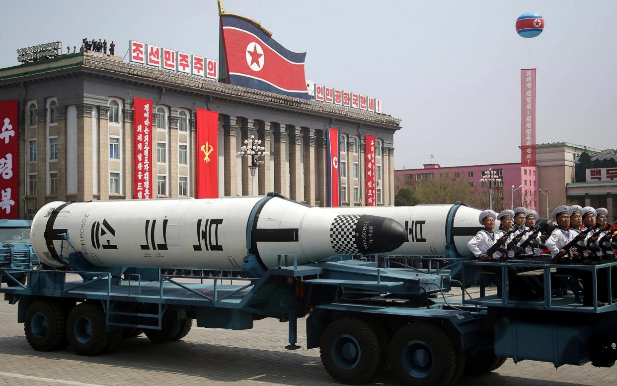 A submarine missile is paraded across Kim Il Sung Square during a military parade in Pyongyang, North Korea, in 2017 - AP