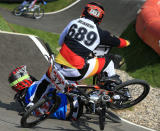 Maik Baier of Germany crashes into Tory Nyhaug of Canada during the Men's BMX Cycling Quarter Finals on Day 13 of the London 2012 Olympic Games at BMX Track on August 9, 2012 in London, England. (Getty Images)