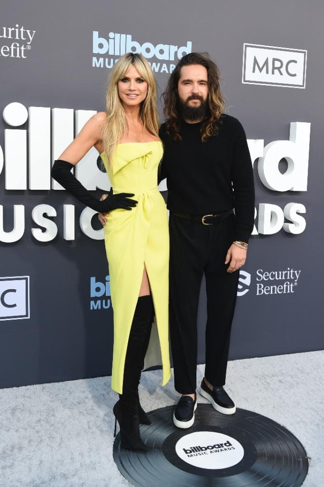 Heidi Klum Pops in Yellow Dress and Sharp Thigh-High Boots on Billboard  Music Awards 2022 Red Carpet