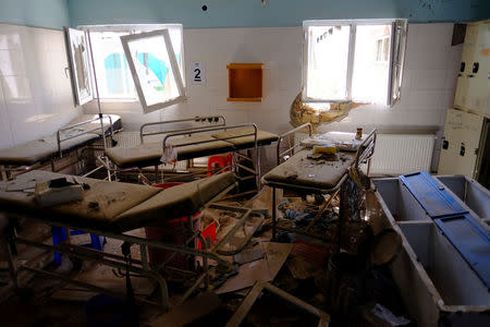 Hospital beds lay in the Medecins Sans Frontieres hospital in Kunduz, Afghanistan, about six months after an American airstrike killed dozens of patients, some of whom burned to death in their beds. REUTERS/ Josh Smith