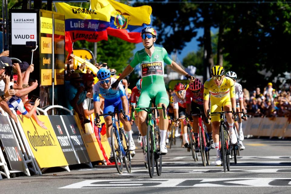 Wout van Aert wins stage eight on the line (REUTERS)