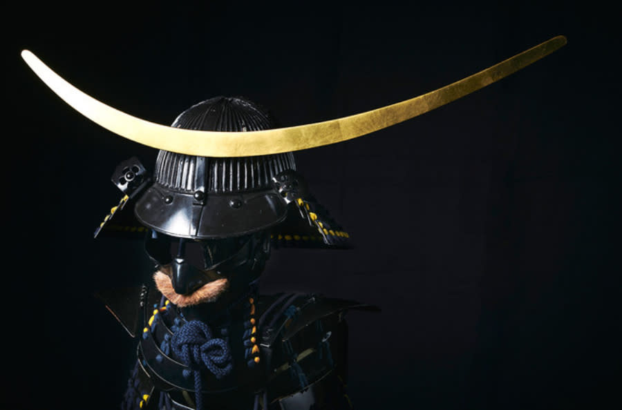 A look at Date Masamune's helmet, which has a very long, slim, horizontal ornament on its front.