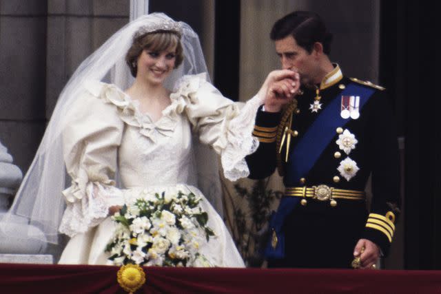 <p>Terry Fincher/Princess Diana Archive/Getty</p> Princess Diana and Prince Charles on their wedding day in July 1981