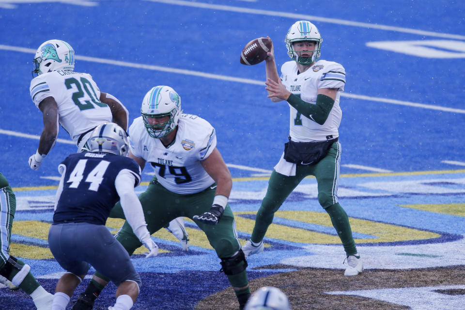 Tulane quarterback Michael Pratt (7) looks to throw a pass against Nevada during the first half of the Idaho Potato Bowl NCAA college football game, Tuesday, Dec. 22, 2020, in Boise, Idaho. (AP Photo/Steve Conner)