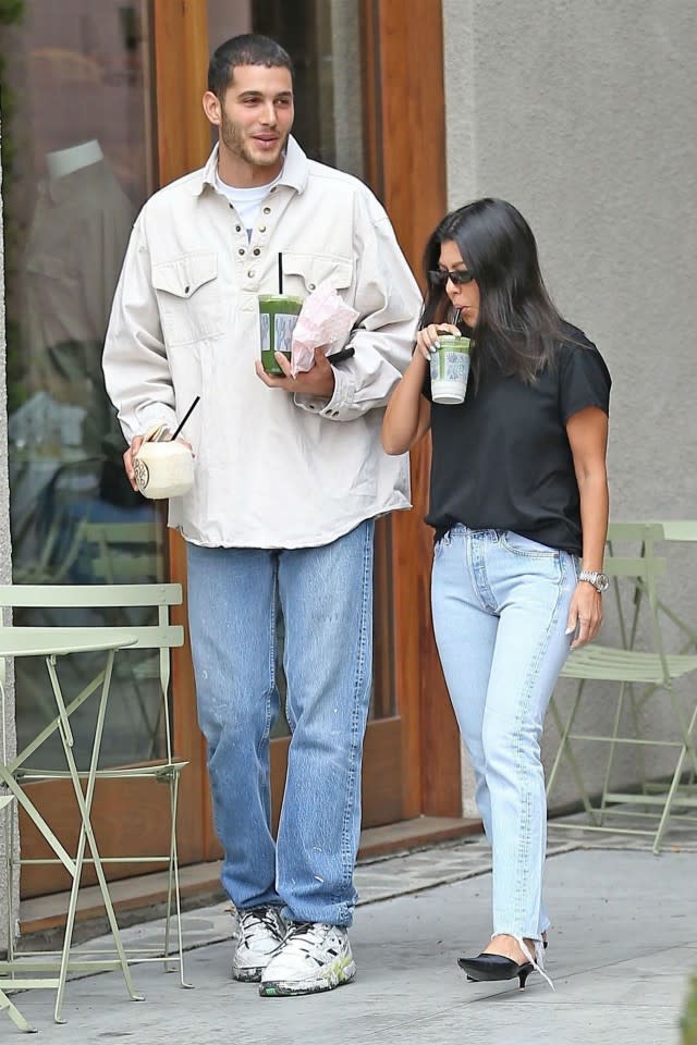 A source recently told ET that Kourtney is “happily single."