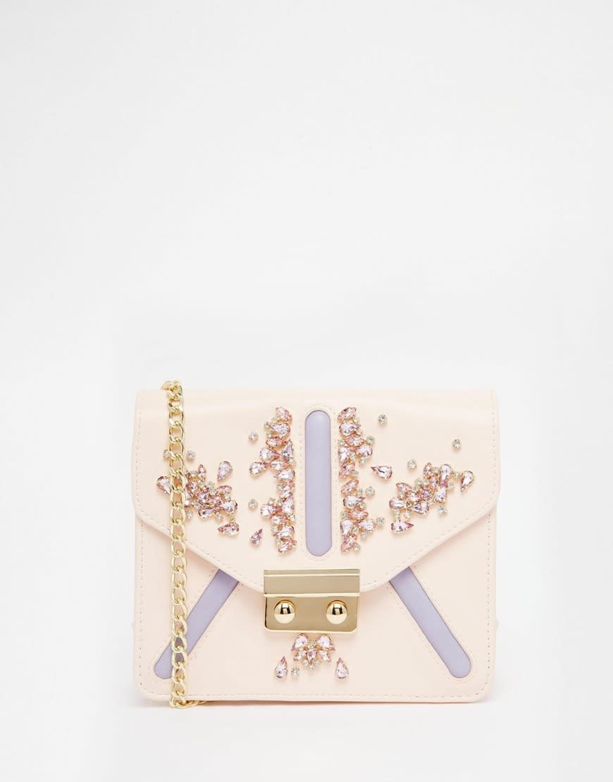 <p>An embellished bag can take an outfit from zero to hero. We have fallen head over heels for this ASOS design.<i><a href="http://www.asos.com/asos/asos-embellished-chain-cross-body-bag/prod/pgeproduct.aspx?iid=5930697&clr=Multi&SearchQuery=chain+bag&pgesize=36&pge=0&totalstyles=49&gridsize=3&gridrow=3&gridcolumn=3" rel="nofollow noopener" target="_blank" data-ylk="slk:[ASOS, £28];elm:context_link;itc:0;sec:content-canvas" class="link "> [ASOS, £28]</a></i></p>