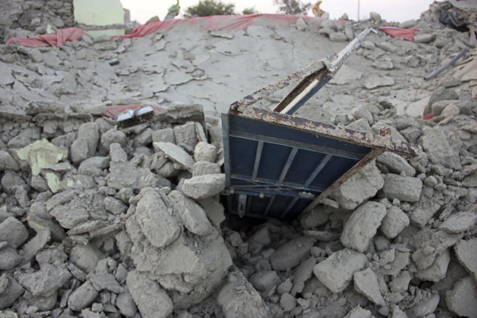 The rubble of a house is seen after it collapsed following the quake in the town of Awaran