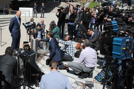 Michael Avenatti, lawyer for adult-film actress Stephanie Clifford, also known as Stormy Daniels, speaks to the media outside the U.S. District Court for the Central District of California after a hearing regarding Clifford's case against Donald J. Trump in Los Angeles, California, April 20, 2018. REUTERS/Lucy Nicholson