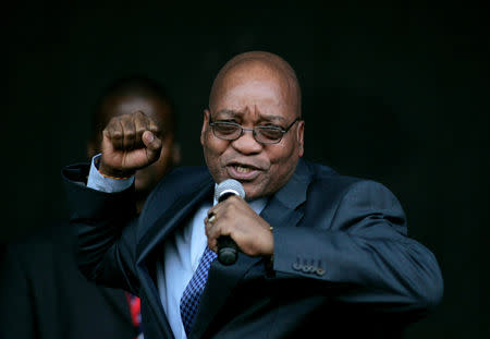 FILE PHOTO: Jacob Zuma, leader of South Africa's ruling African National Congress (ANC), sings for his supporters at the Pietermaritzburg high court outside Durban August 4, 2008. REUTERS/Siphiwe Sibeko/FILE Photo