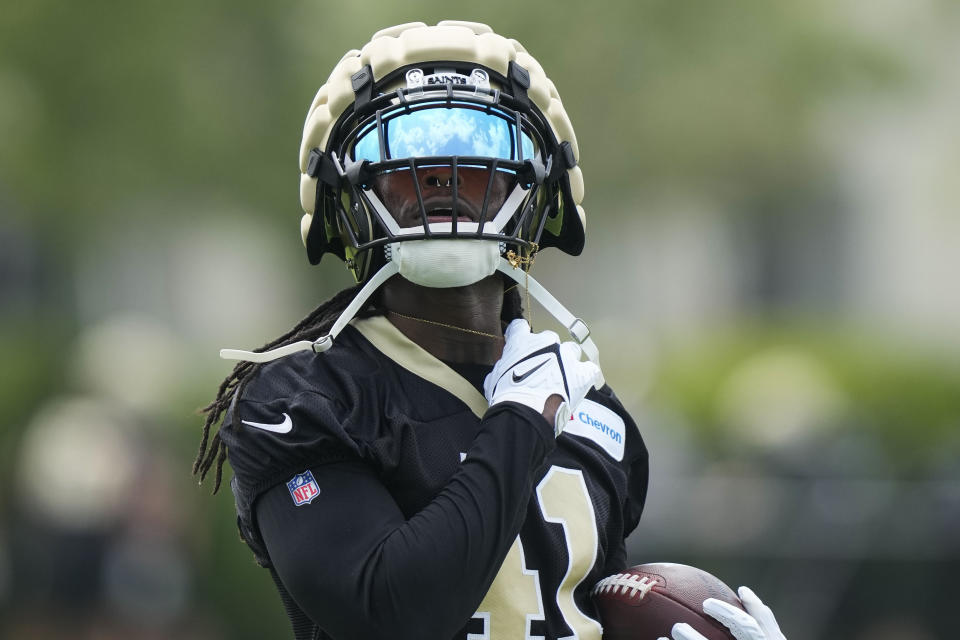 New Orleans Saints running back Alvin Kamara (41) runs through drills at the team's NFL football minicamp in Metairie, La., Thursday, June 15, 2023. (AP Photo/Gerald Herbert)