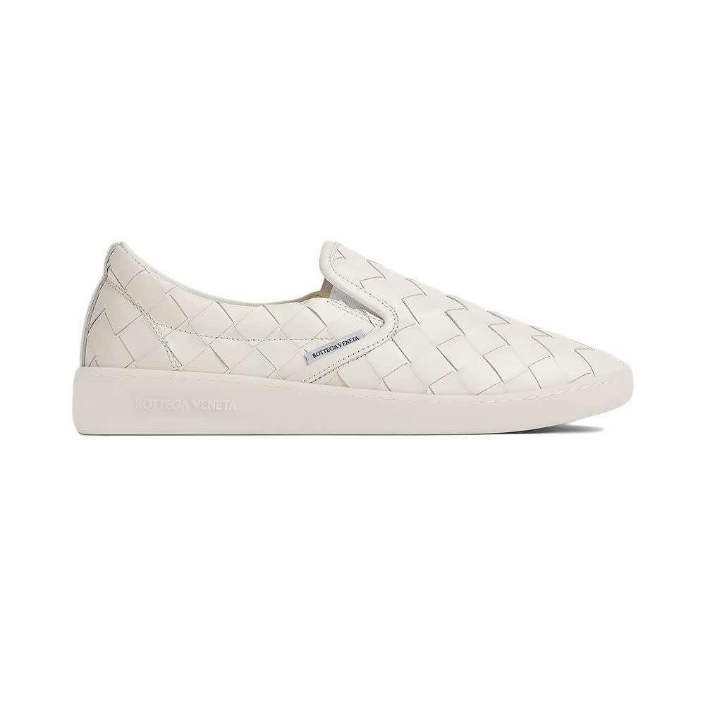 <p><a href="https://go.redirectingat.com?id=74968X1596630&url=https%3A%2F%2Fwww.bottegaveneta.com%2Fen-us%2Fsawyer-sneaker-white-813291171.html&sref=https%3A%2F%2Fwww.elle.com%2Ffashion%2Fshopping%2Fg60372123%2Fbest-slip-on-sneakers-women%2F" rel="nofollow noopener" target="_blank" data-ylk="slk:Shop Now;elm:context_link;itc:0;sec:content-canvas" class="link rapid-noclick-resp">Shop Now</a></p><p>Sawyer Sneaker </p><p>Bottega Veneta</p><p>$1050.00</p>