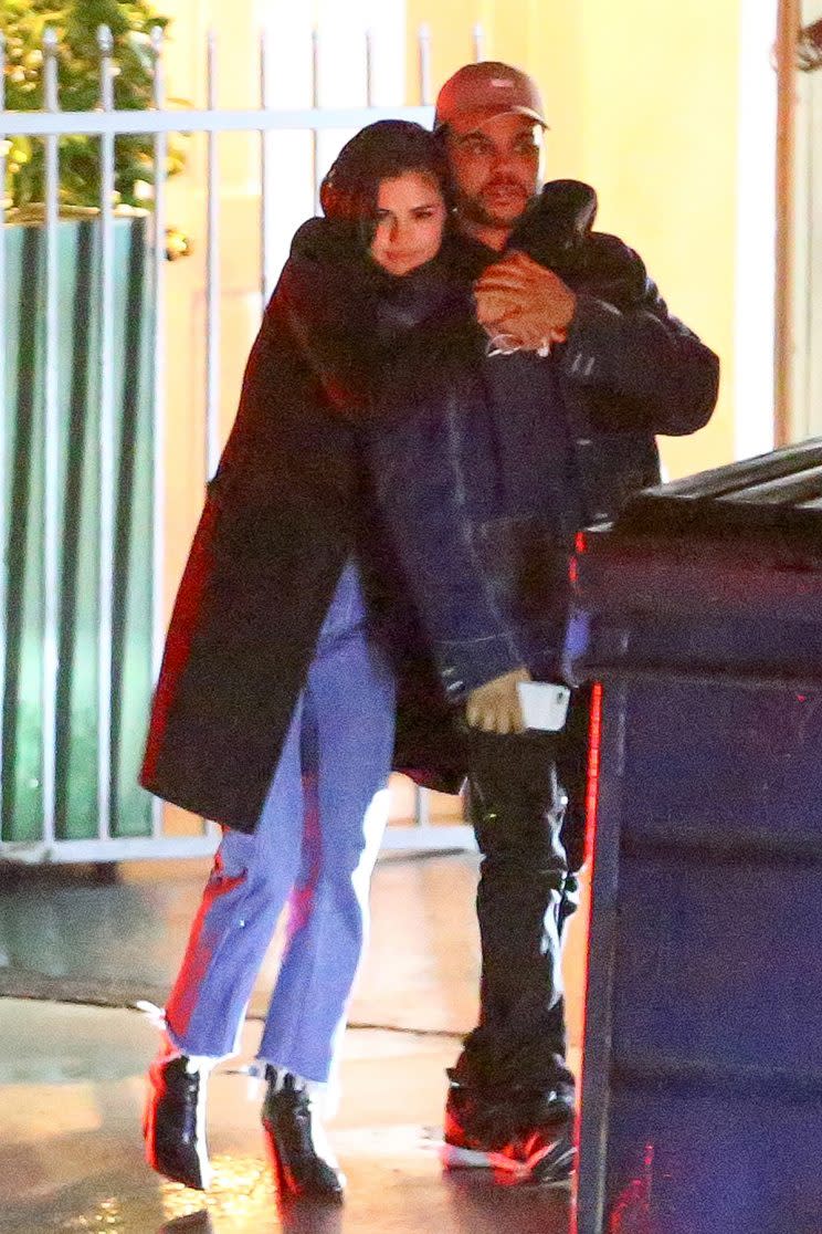 Selena Gomez and The Weeknd couldn’t keep their hands off each other as they emerged from Giorgio Baldi. (Photo: Maciel / AKM-GSI)