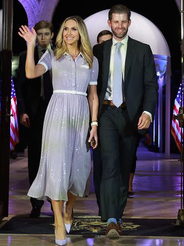 <p>Joe Raedle/Getty</p> Eric Trump and Lara Trump arrive to listen as former U.S. President Donald Trump speaks during an event at his Mar-a-Lago home on November 15, 2022.