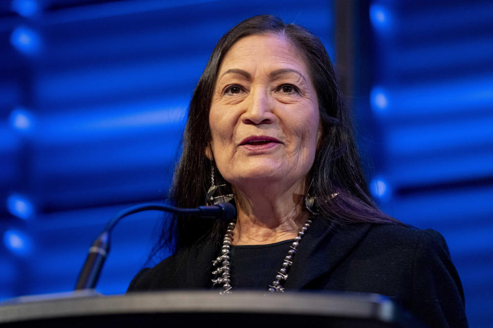 FILE - Interior Secretary Deb Haaland speaks at the National Geographic Society in Washington, Friday, March 3, 2023. Oil and gas companies will have to pay more to drill on public lands and satisfy stronger requirements to clean up old or abandoned wells under a final rule issued Friday, April 12, 2024, by the Biden administration. The Interior Department rule does not go so far as to prohibit new oil and gas leasing on public lands, as many environmental groups have urged and as President Joe Biden promised during the 2020 campaign. (AP Photo/Andrew Harnik, File)