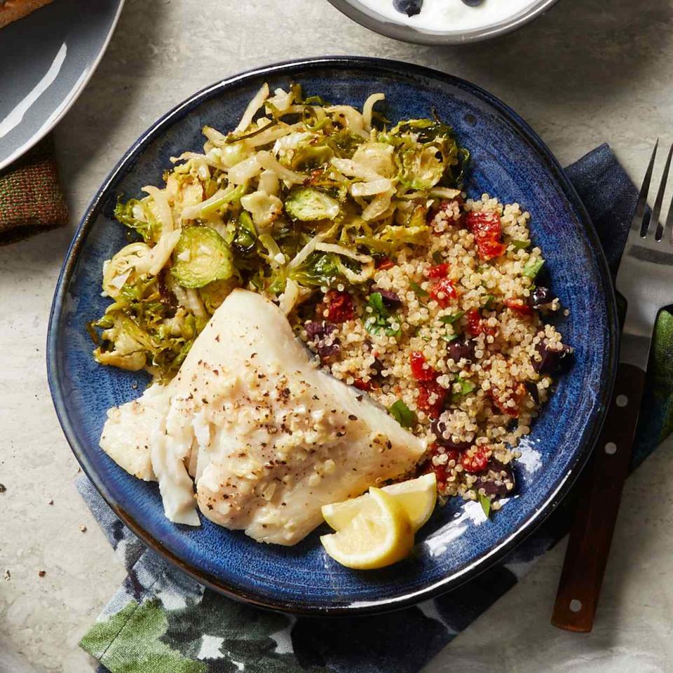 <p>Fish plus two sides? It seems fancy but this healthy dinner comes together in just 30 minutes. <a href="https://www.eatingwell.com/recipe/276964/baked-halibut-with-brussels-sprouts-quinoa/" rel="nofollow noopener" target="_blank" data-ylk="slk:View Recipe;elm:context_link;itc:0;sec:content-canvas" class="link ">View Recipe</a></p>