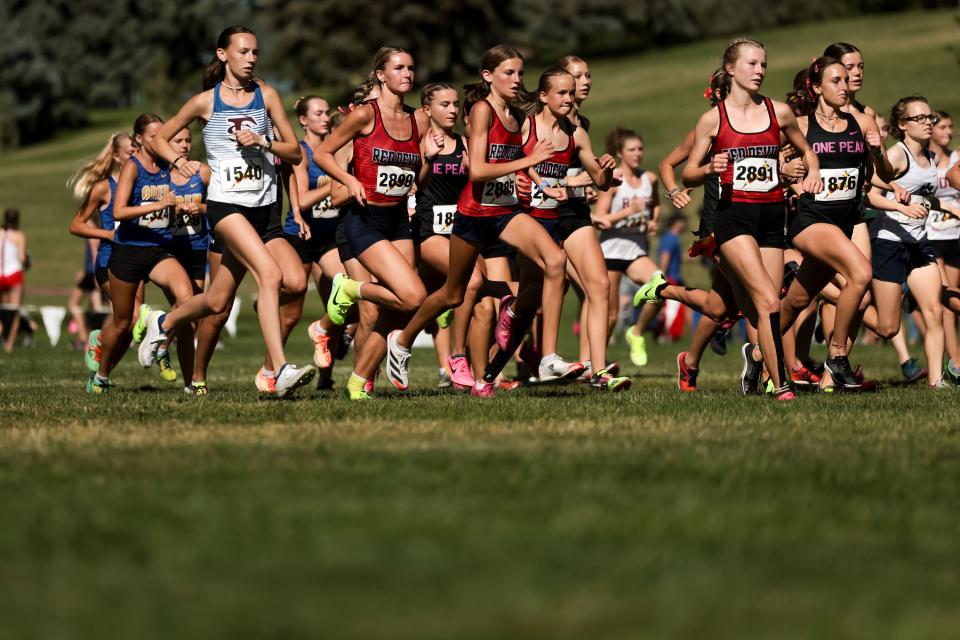 Racers compete in the championship girls race at the Border Wars XC meet at Sugar House Park in Salt Lake City on Saturday, Sept. 16, 2023. | Spenser Heaps, Deseret News