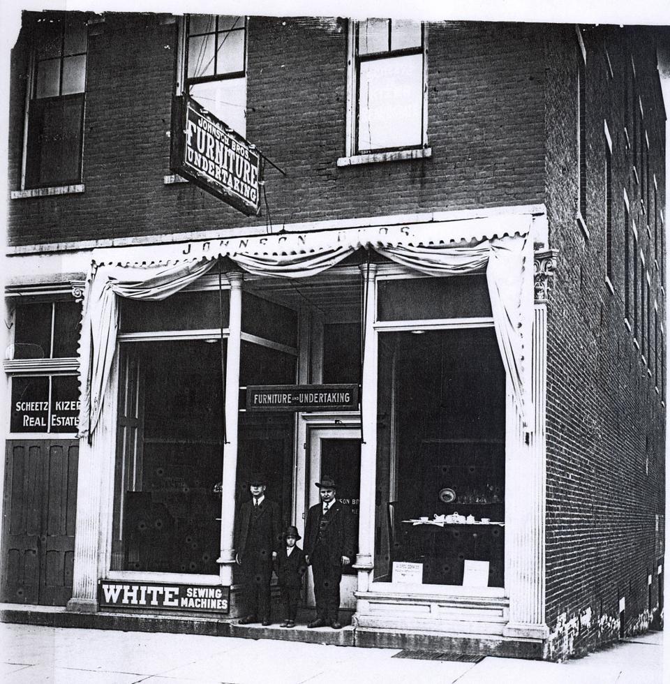 The Johnson Brothers Furniture and Undertaking business, seen here, occupied the the 1865 building that later became The Rees in downtown Plymouth. From left, Ralph Johnson stands with his son, Francis, and brother/partner Floyd Johnson.