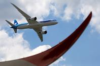 FILE PHOTO: An Boeing 787-9 Dreamliner of Air Tahiti Nui performs during the 53rd International Paris Air Show at Le Bourget Airport near Paris
