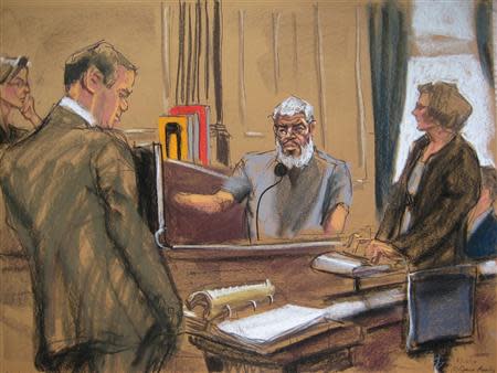 Judge Katherine Forrest (L) looks on as Abu Hamza al-Masri (R), the radical Islamist cleric facing U.S. terrorism charges, replies to questiones from his defense lawyer Joshua Dratel (C) in Manhattan federal court in New York in this artist's sketch May 12, 2014. Standing on the far right is a court reporter. REUTERS/Jane Rosenberg