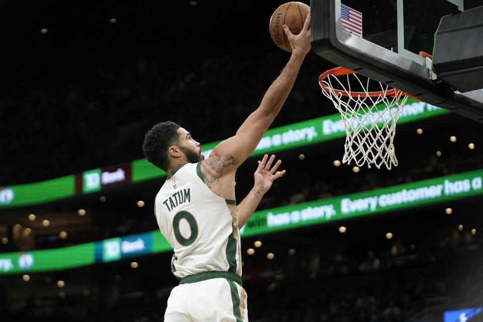 Boston Celtics forward Jayson Tatum (0) drives to the basket in the second half of an NBA In-Season Tournament basketball game against the Chicago Bulls, Tuesday, Nov. 28, 2023, in Boston. (AP Photo/Steven Senne)