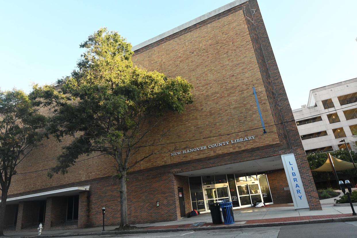 The main New Hanover County Library at 201 Chestnut Street in downtown Wilmington, N.C. New Hanover County became one of the latest libraries to end fines for overdue books. In recent years, libraries across the nation have moved to eliminate fines as a way to get rid of barriers. KEN BLEVINS/STARNEWS