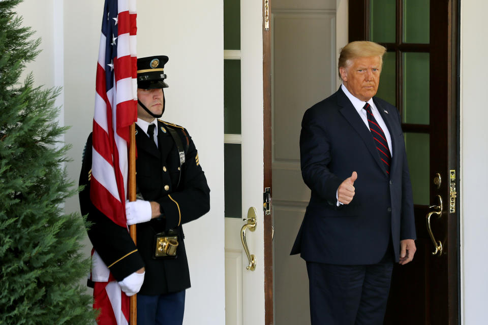 WASHINGTON, DC - AUGUST 20: U.S. President Donald Trump awaits the arrival of Iraqi Prime Minister Mustafa Al-Kadhimi outside the West Wing of the White House August 20, 2020 in Washington, DC. One day before the meeting, Trump announced that he will allow UN Security Council sanctions to 'snap back' into place against Iran, one of Iraq's neighbors and closest allies, even as U.S. troop levels in Iraq and Syria would most likely shrink in the coming months. (Photo by Chip Somodevilla/Getty Images)