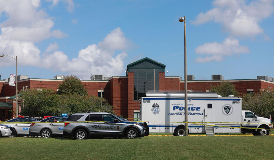 Newport News Police are on the scene at Heritage High School responding to a shooting incident Monday, Sept. 20, 2021 in Newport News, Va. (Kaitlin McKeown/The Virginian-Pilot via AP)