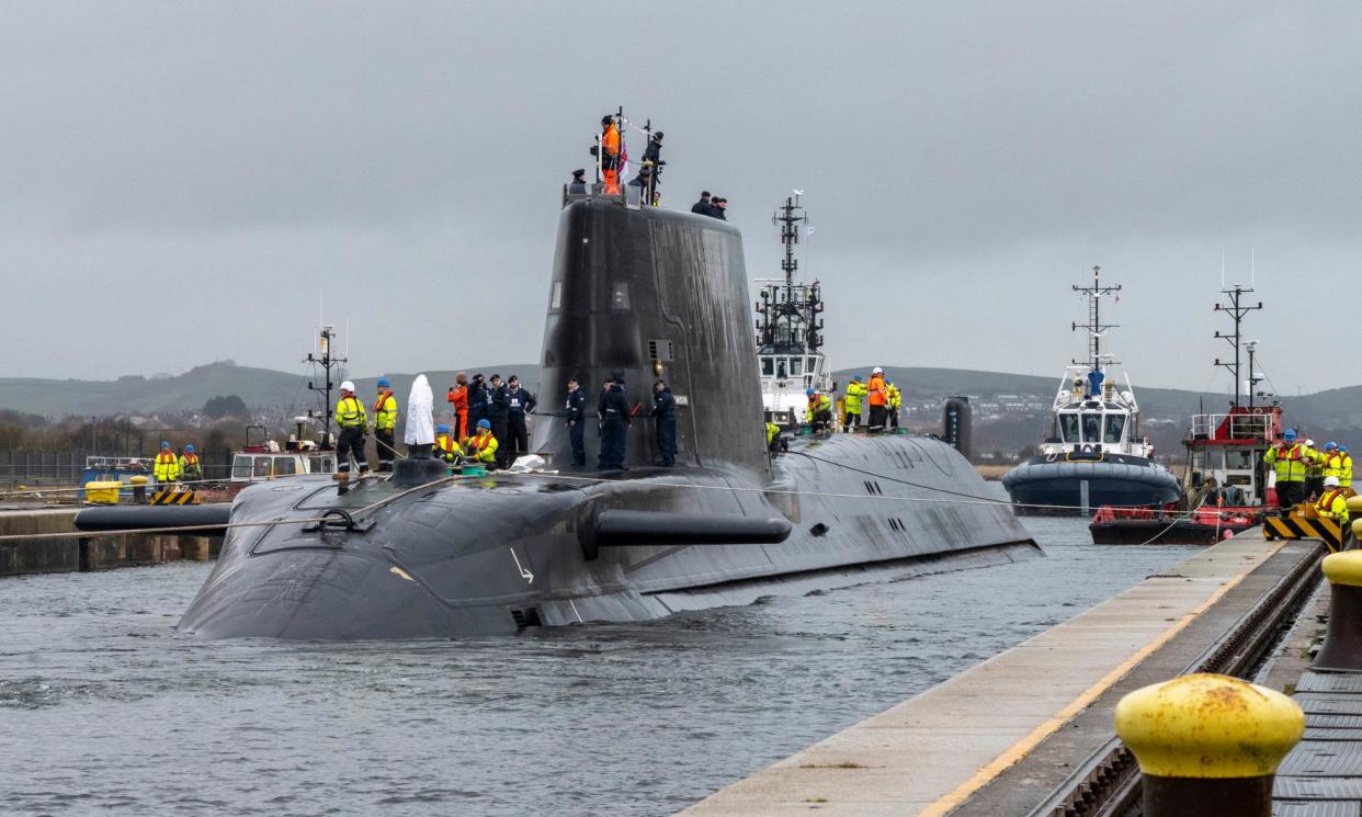 <span>HMS Anson, a submarine designed and built for the Royal Navy, departs a BAE Systems shipyard in Barrow-in-Furness, Cumbria in 2023.</span><span>Photograph: BAE Systems/PA</span>