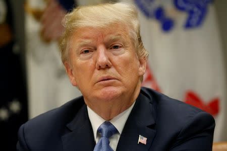 FILE PHOTO - U.S. President Donald Trump takes part in a working lunch with governors in the Roosevelt Room at the White House in Washington, U.S., June 21, 2018. REUTERS/Leah Millis