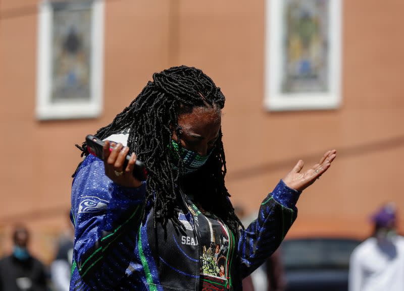 FILE PHOTO: A community gathering remembering George Floyd, Breonna Taylor and Ahmaud Arbery outside First African Methodist Episcopal Church in Seattle