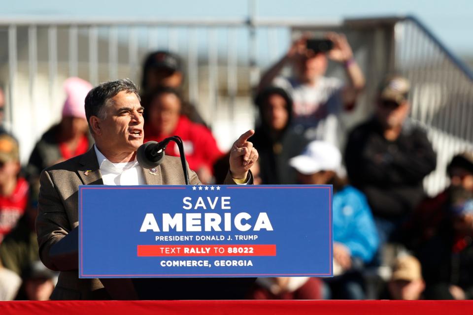 Georgia Rep. Andrew Clyde speaks at a "Save America Rally" at the Banks County Dragway on Saturday, March 26, 2022.