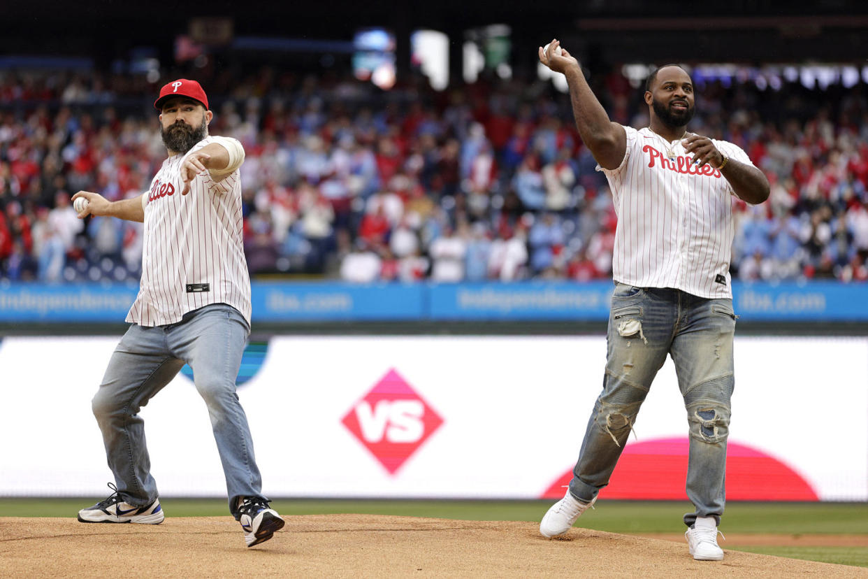 Recently retired Philadelphia Eagles legends Jason Kelce and Fletcher Cox throw out the first pitch before a game between the Atlanta Braves and Philadelphia Phillies at Citizens Bank Park on March 30, 2024 in Philadelphia, Pennsylvania. (Rich Schultz / Getty Images)