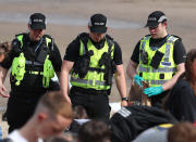 Police at Portobello Beach in Edinburgh confiscating alcohol from beachgoers and breaking up large crowds who flocked to the beach to make the most of the good weather.