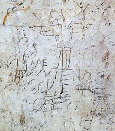 <span class="caption">Second century pagan graffito depicting a man worshipping a crucified donkey-headed figure.</span>
