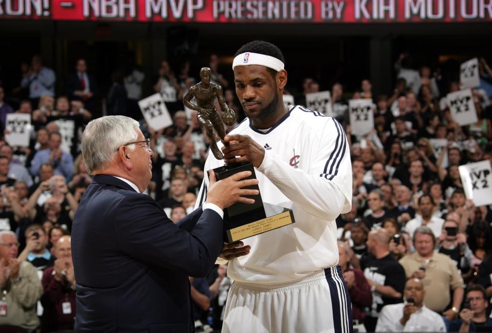 CLEVELAND - MAY 3: NBA Commissioner David Stern presents LeBron James #23 of the Cleveland Cavaliers with his Maurice Podoloff Trophy in recognition for being named the 2009-10 NBA Most Valuable Player award prior to Game Two of the Eastern Conferense Semifinals against the Boston Celtics during the 2010 NBA Playoffs at Quicken Loans Arena on May 3, 2010 in Cleveland, Ohio. The Celtics won 104-86.&nbsp;