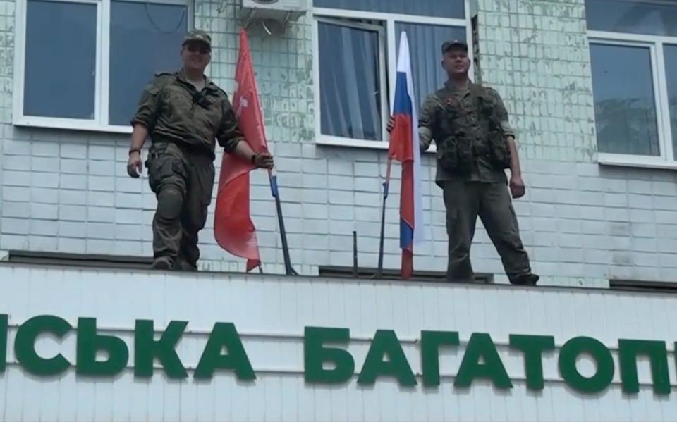 Russian flags are raised on a government building in Lysychansk - EPN/Newscom/Avalon