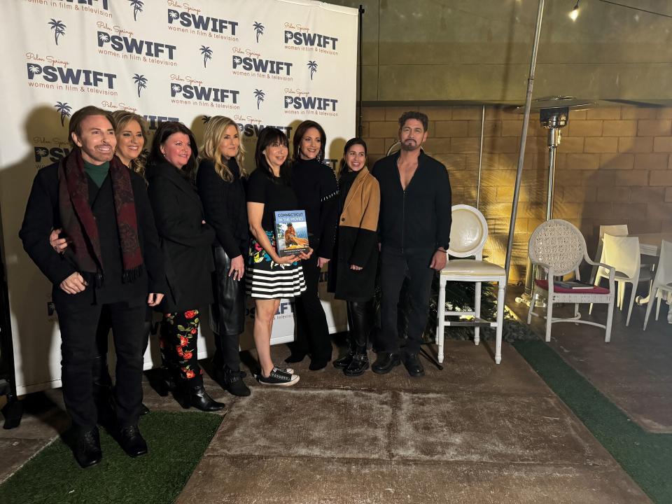 Illeana Douglas poses with PSWIFT members at Eight4Nine on Jan. 10, 2024.