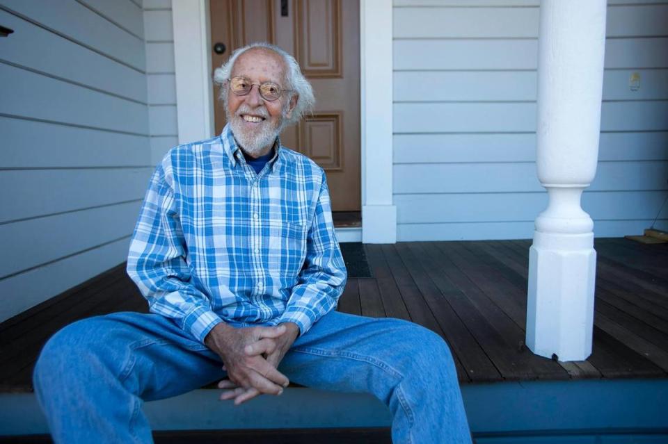 Harry Farmer, a Cambria services district director, poses for a portrait on the front porch of the Cambria Historical Society.